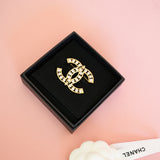 CHANEL BROOCH